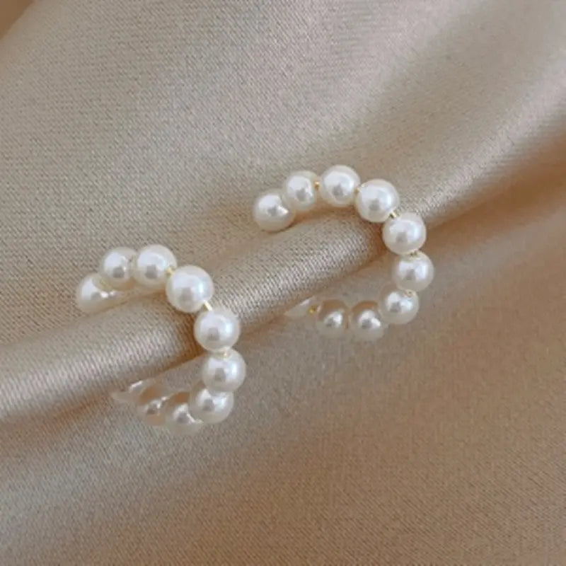 Sweet C-shaped Pearl Temperament Small Earrings Xianfanins Wind Ear Clip Conceitastral
